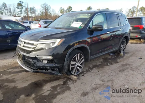 2017 Honda Pilot Touring z USA, uszkodzony, nr VIN 5FNYF6H92HB060138
